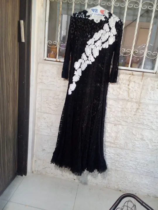 Black lace gown with white beaded lace