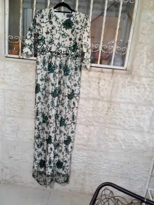 Beige gown with green sequins
