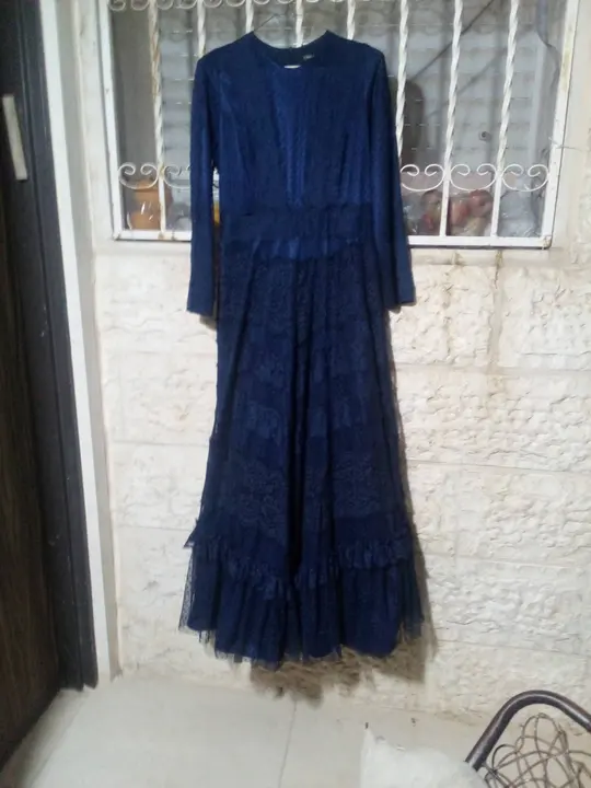 Navy lace gown with tiered skirt